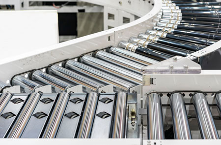 Gravity vs. Powered Roller Conveyors